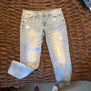 White House Black market denim girlfriend jeans. Lace in stressed holes.